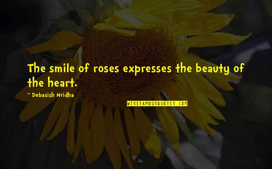 Beauty And Roses Quotes By Debasish Mridha: The smile of roses expresses the beauty of