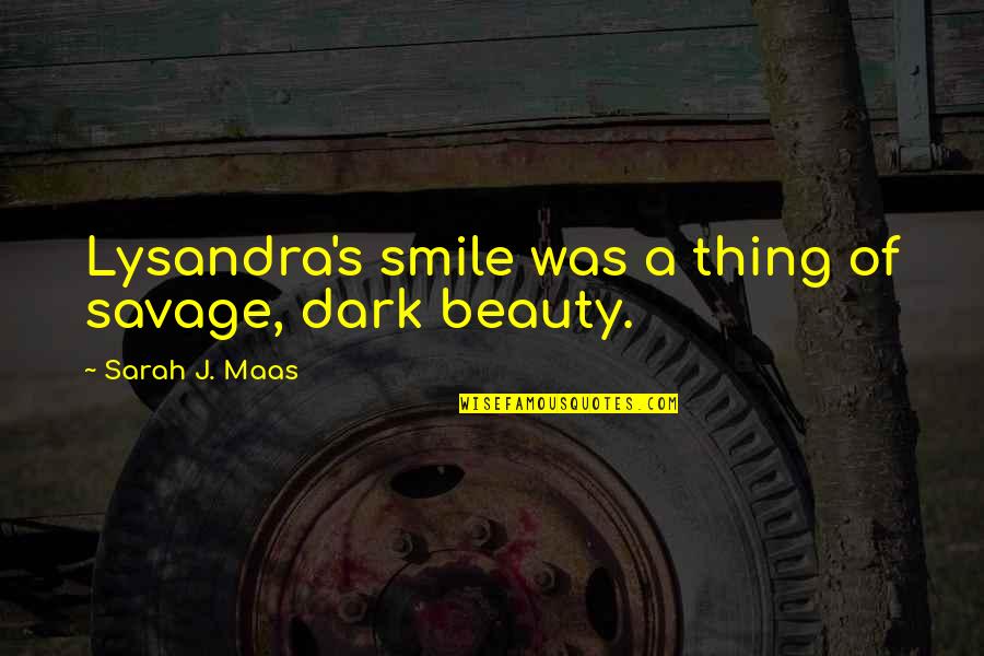 Beauty In The Dark Quotes By Sarah J. Maas: Lysandra's smile was a thing of savage, dark