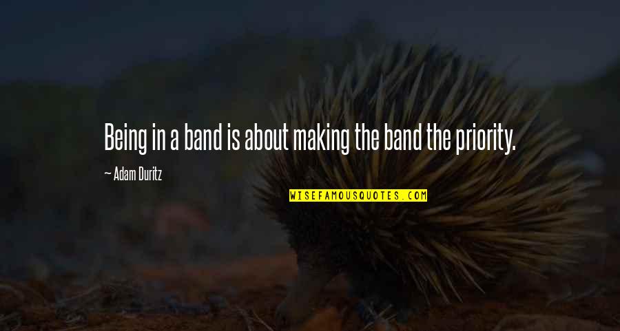 Beauty Lies In Strength Quotes By Adam Duritz: Being in a band is about making the
