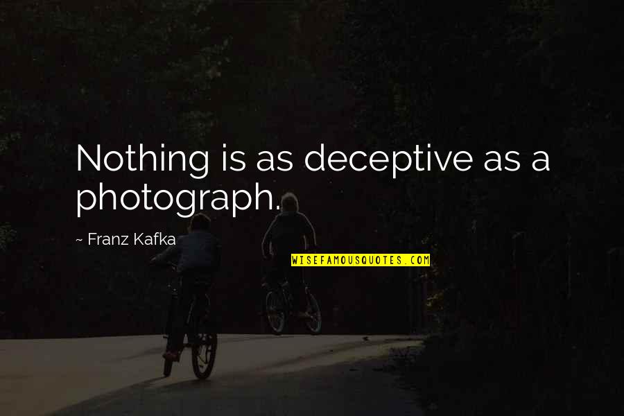 Behind Every Woman Funny Quotes By Franz Kafka: Nothing is as deceptive as a photograph.