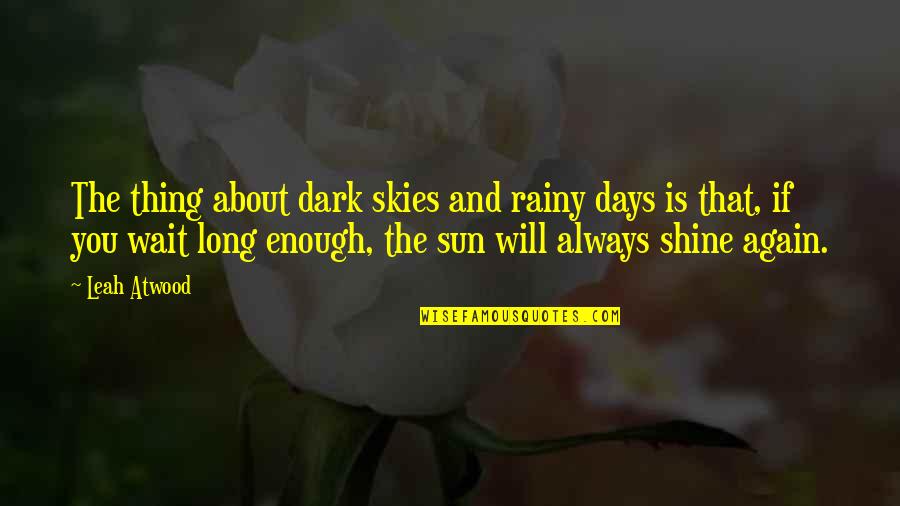 Best Dark Love Quotes By Leah Atwood: The thing about dark skies and rainy days