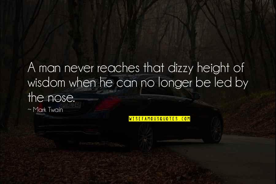 Best Dizzy Quotes By Mark Twain: A man never reaches that dizzy height of