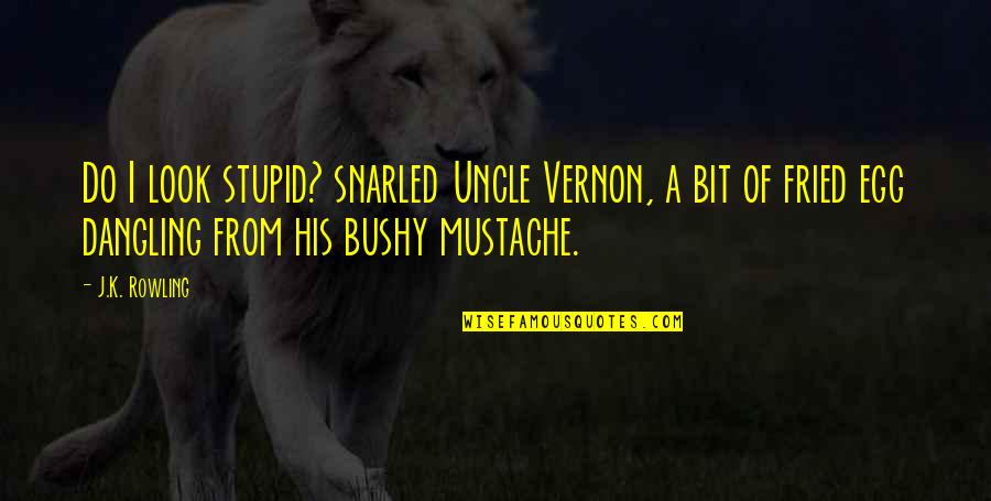 Best Mustache Quotes By J.K. Rowling: Do I look stupid? snarled Uncle Vernon, a Best Mustache Quotes By J.K. Rowling: Do I look stupid? snarled Uncle Vernon, a