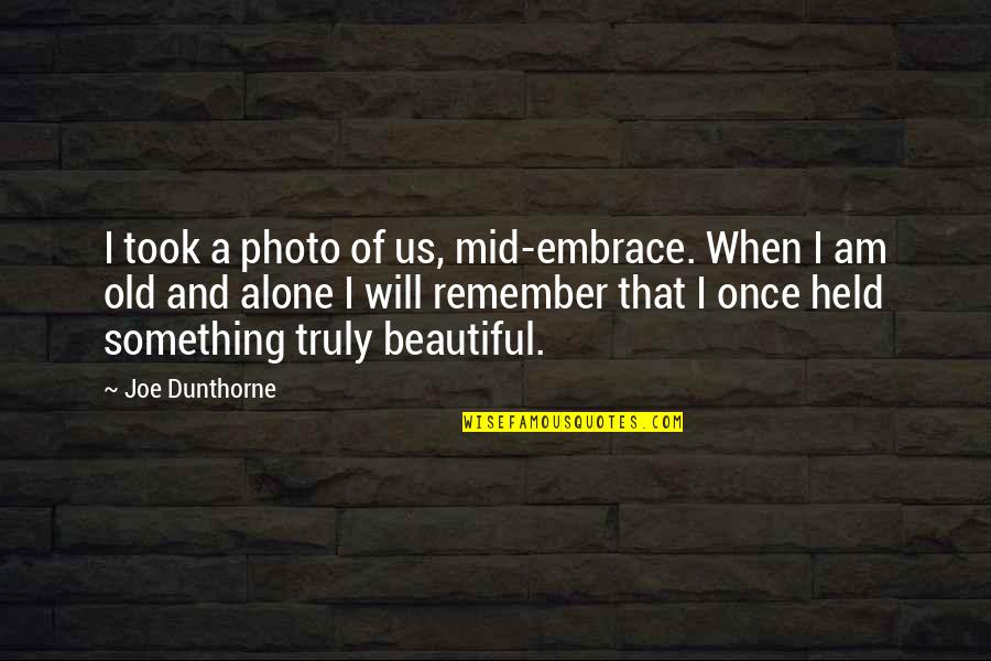 Best Photo Quotes By Joe Dunthorne: I took a photo of us, mid-embrace. When