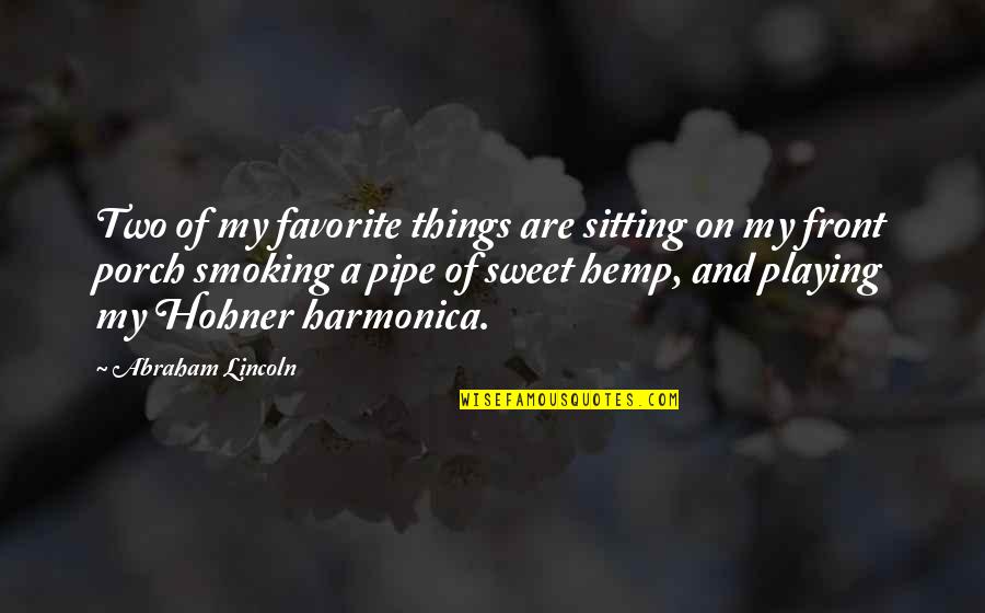Best Pipe Smoking Quotes By Abraham Lincoln: Two of my favorite things are sitting on Best Pipe Smoking Quotes By Abraham Lincoln: Two of my favorite things are sitting on