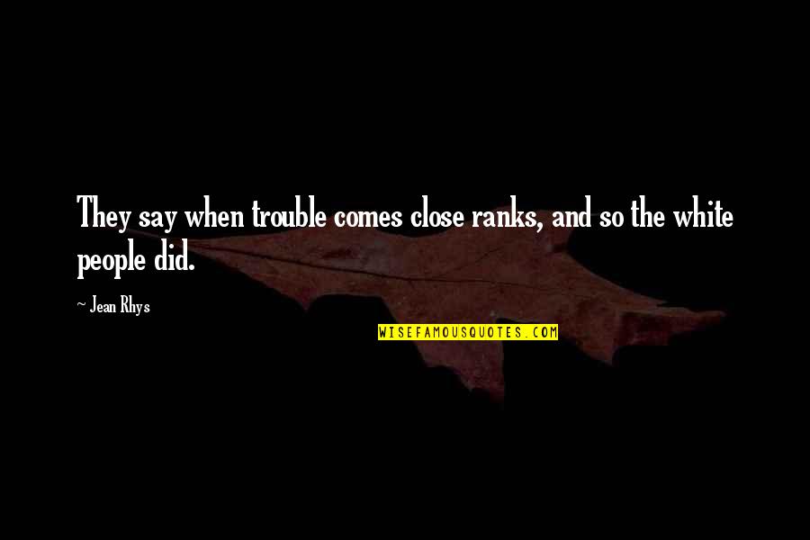 Best Rhys Quotes By Jean Rhys: They say when trouble comes close ranks, and