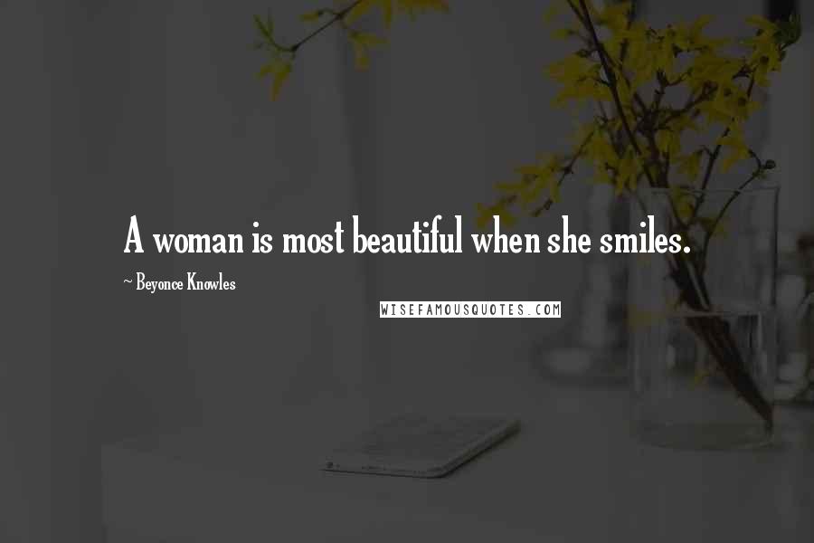 Beyonce Knowles quotes: A woman is most beautiful when she smiles.