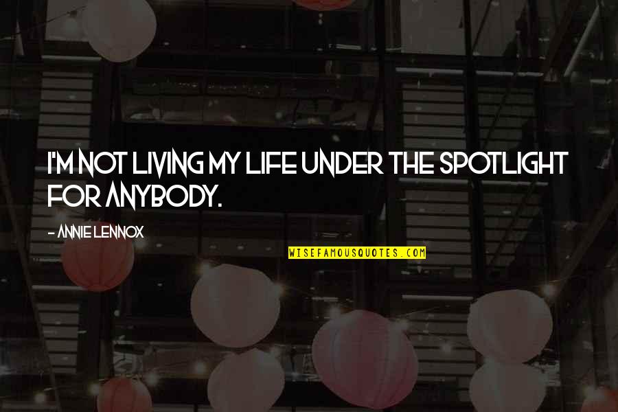 Bilinmeze Quotes By Annie Lennox: I'm not living my life under the spotlight