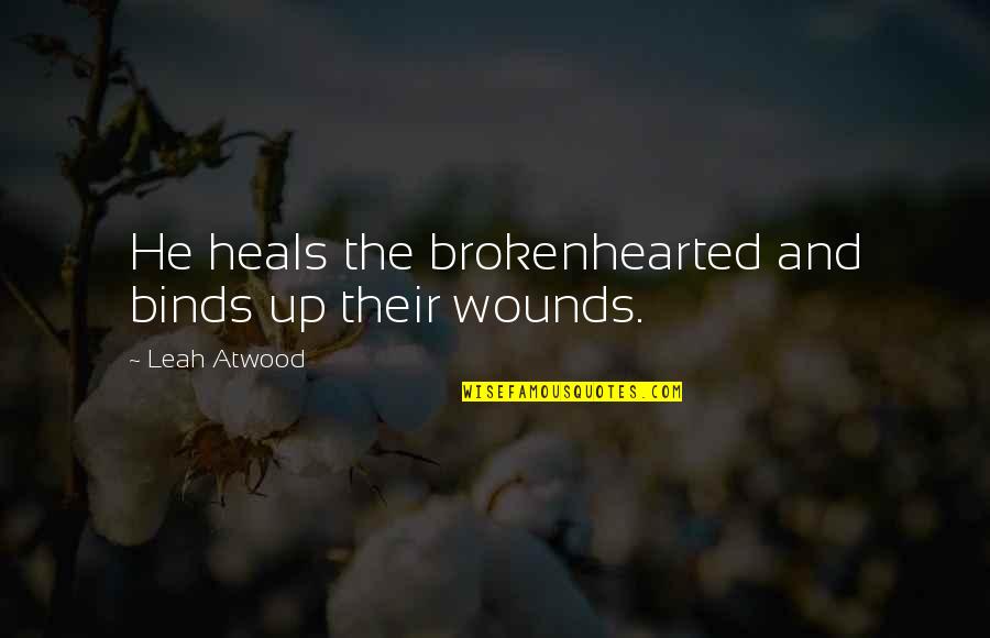 Binds Quotes By Leah Atwood: He heals the brokenhearted and binds up their