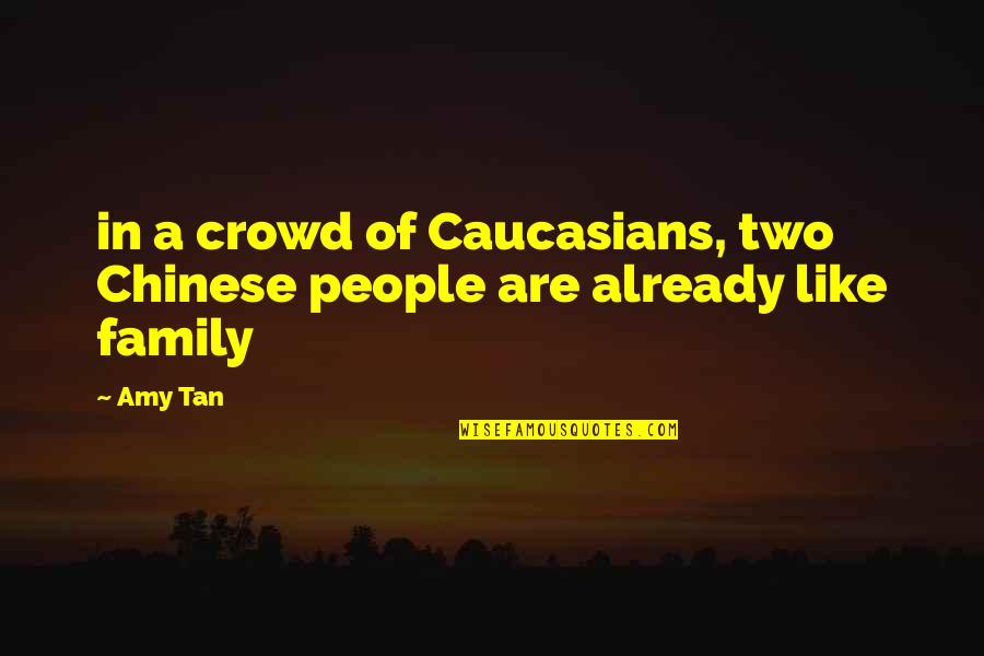 Birkmann Quotes By Amy Tan: in a crowd of Caucasians, two Chinese people