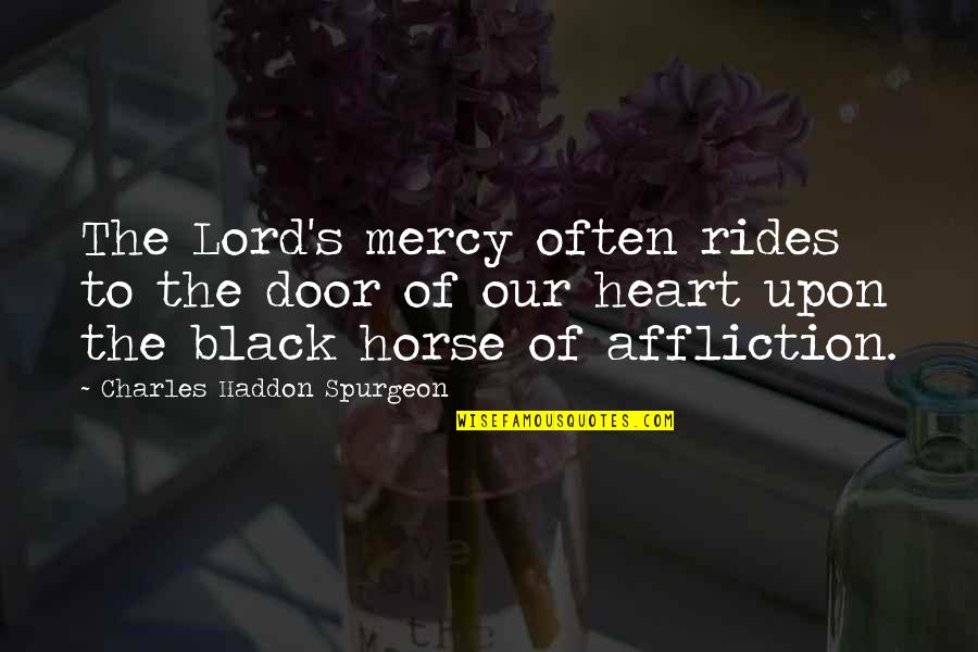 Black Cross Quotes By Charles Haddon Spurgeon: The Lord's mercy often rides to the door