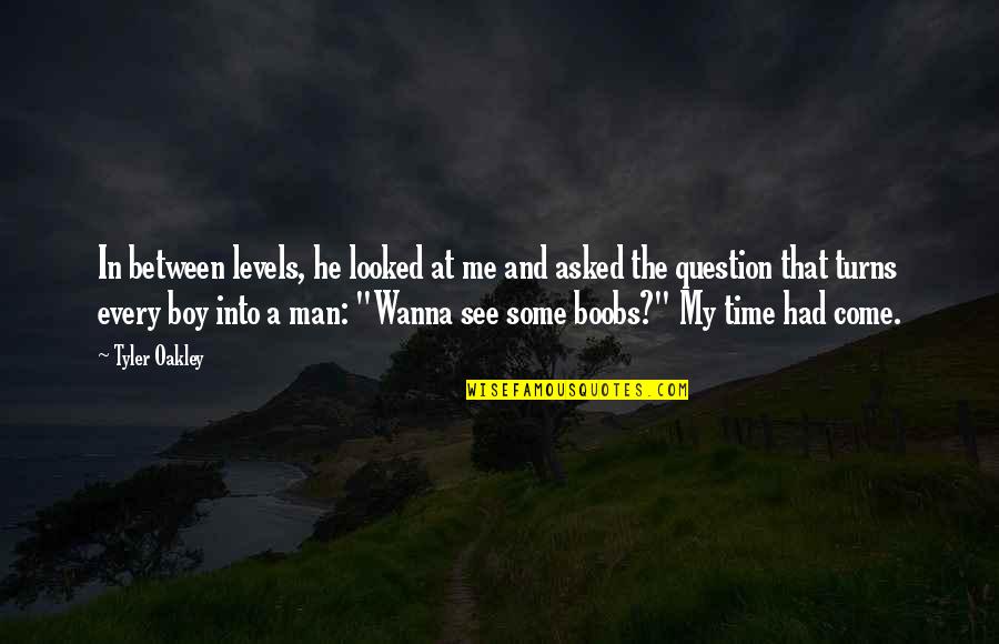 Boy And Man Quotes By Tyler Oakley: In between levels, he looked at me and Boy And Man Quotes By Tyler Oakley: In between levels, he looked at me and