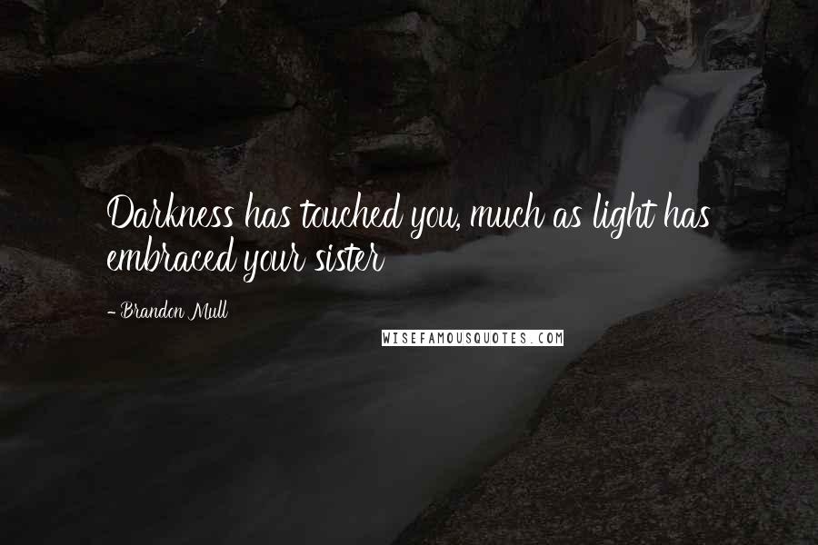 Brandon Mull quotes: Darkness has touched you, much as light has embraced your sister