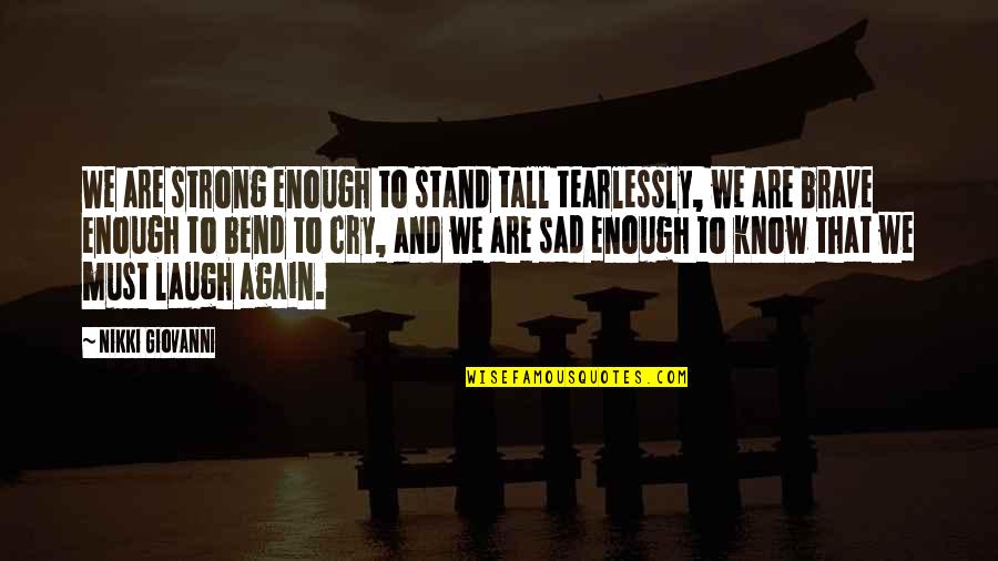 Brave And Strong Quotes By Nikki Giovanni: We are strong enough to stand tall tearlessly,