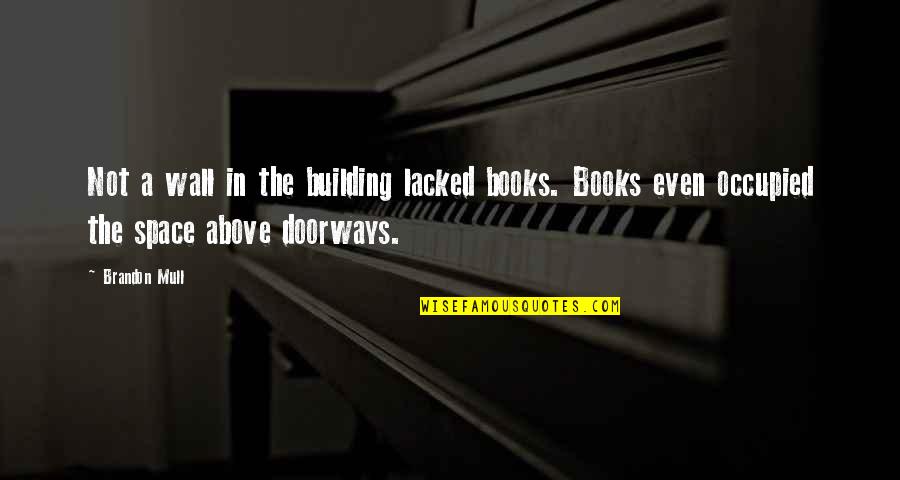 Building A Wall Quotes By Brandon Mull: Not a wall in the building lacked books.