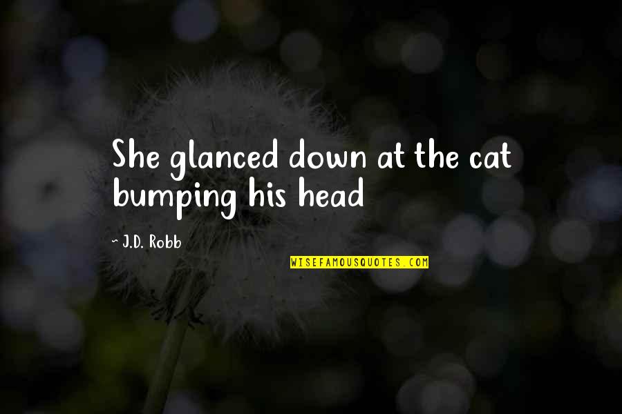 Bumping Into Your Ex Quotes By J.D. Robb: She glanced down at the cat bumping his