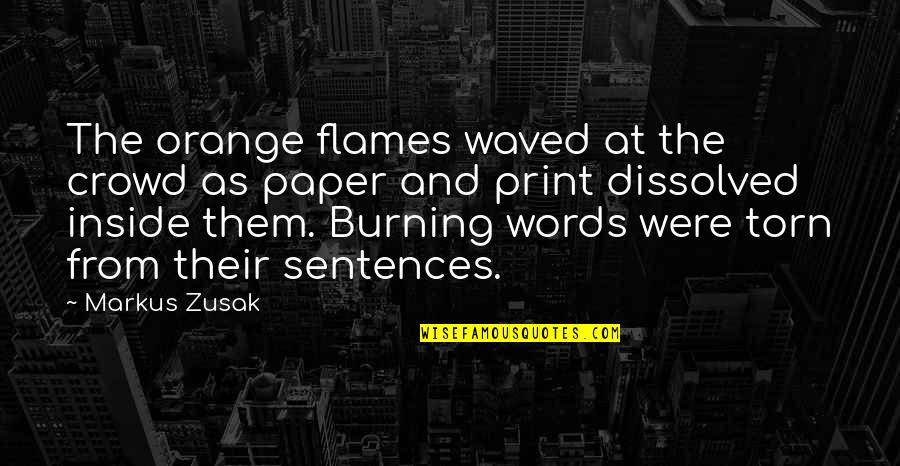 Burning Flames Quotes By Markus Zusak: The orange flames waved at the crowd as Burning Flames Quotes By Markus Zusak: The orange flames waved at the crowd as
