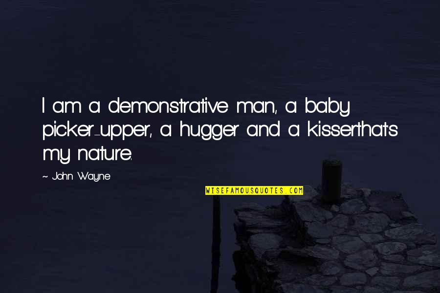 Calumniating Quotes By John Wayne: I am a demonstrative man, a baby picker-upper,