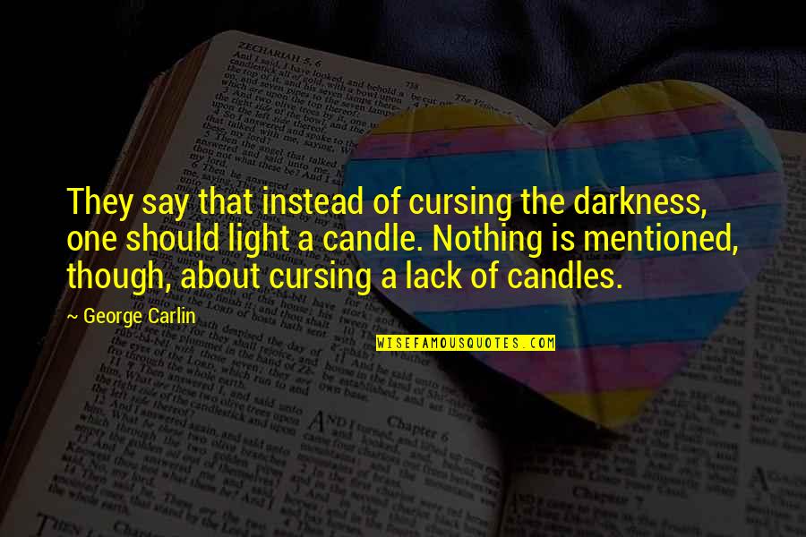 Candle Light Quotes By George Carlin: They say that instead of cursing the darkness,
