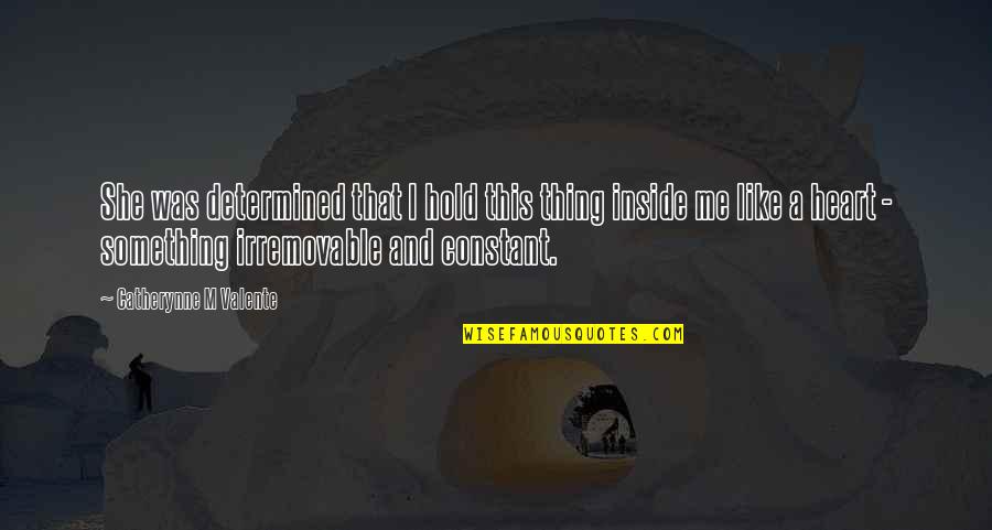 Candles Burning Out Quotes By Catherynne M Valente: She was determined that I hold this thing Candles Burning Out Quotes By Catherynne M Valente: She was determined that I hold this thing