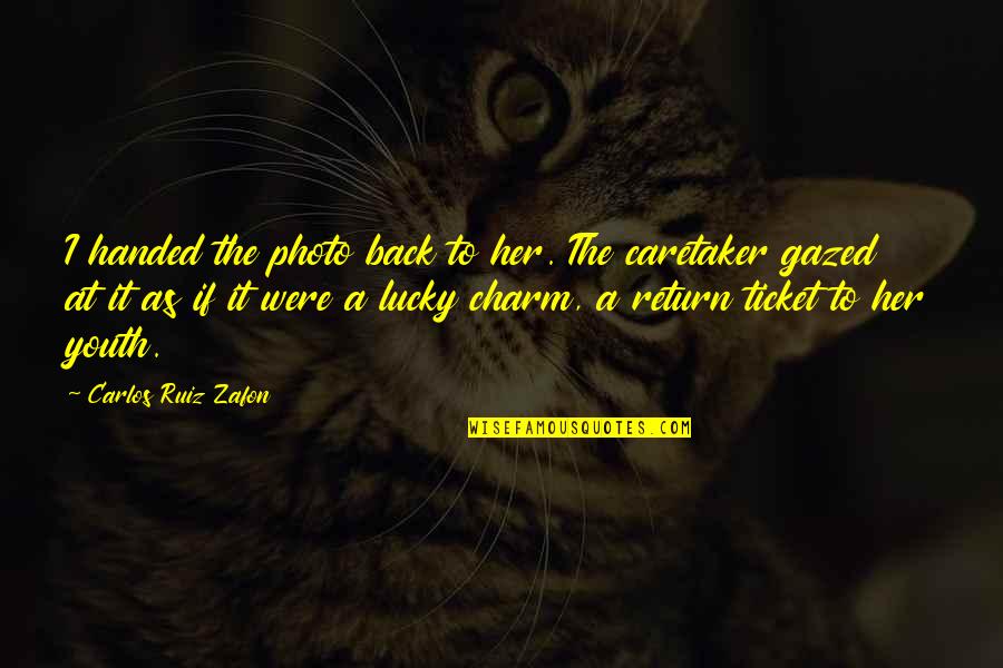 Carlos Zafon Quotes By Carlos Ruiz Zafon: I handed the photo back to her. The