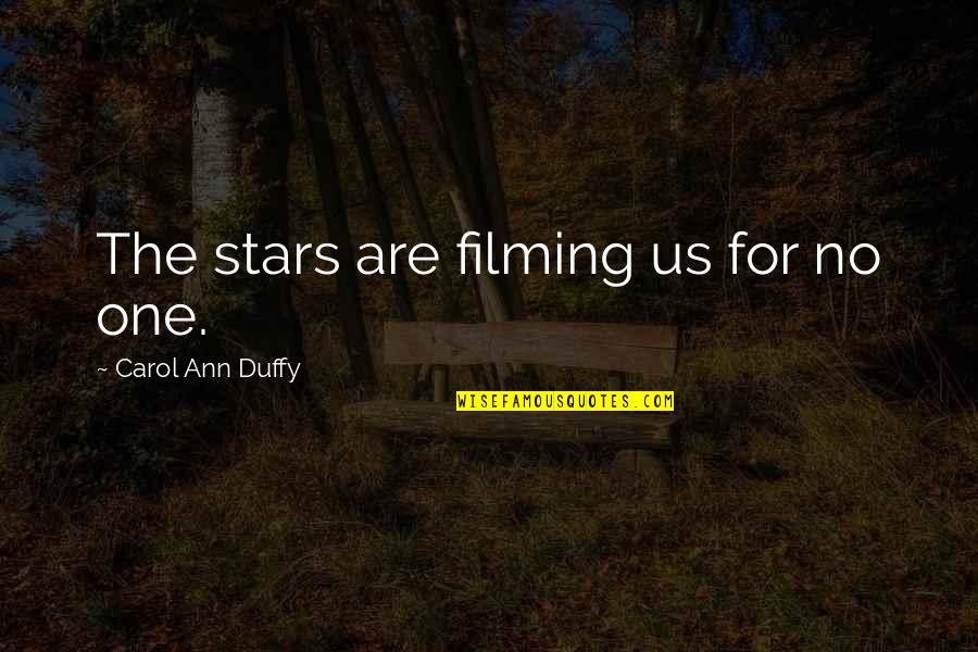 Carol Ann Duffy Quotes By Carol Ann Duffy: The stars are filming us for no one.