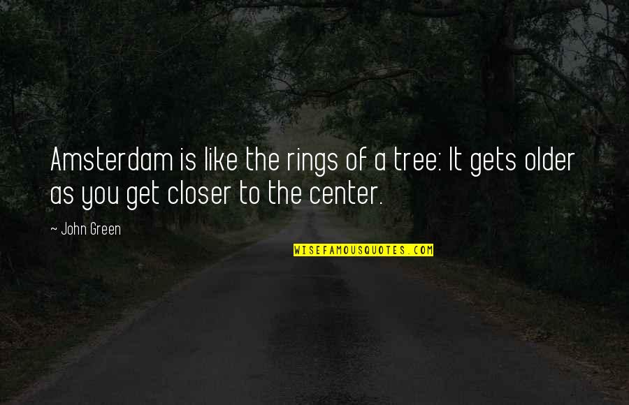 Cell Phones Evolving Quotes By John Green: Amsterdam is like the rings of a tree: