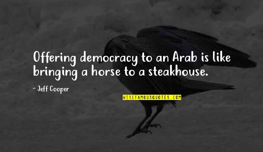 Chanal 9 Quotes By Jeff Cooper: Offering democracy to an Arab is like bringing