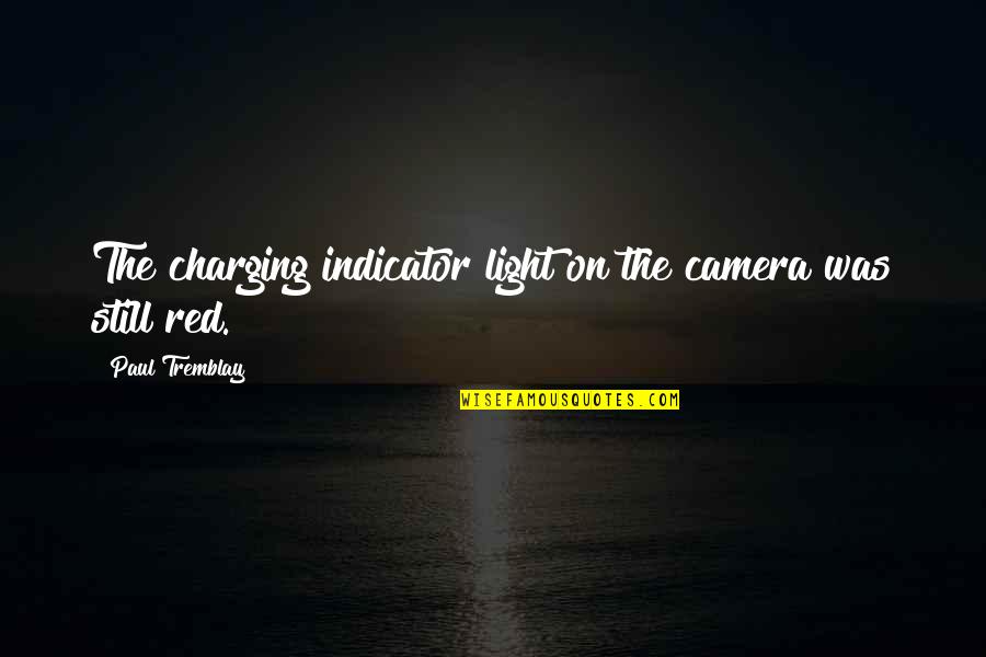 Charging More Than Quotes By Paul Tremblay: The charging indicator light on the camera was