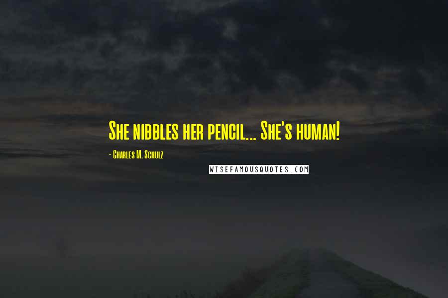 Charles M. Schulz quotes: She nibbles her pencil... She's human!