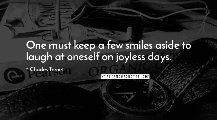 Charles Trenet quotes: One must keep a few smiles aside to laugh at oneself on joyless days.