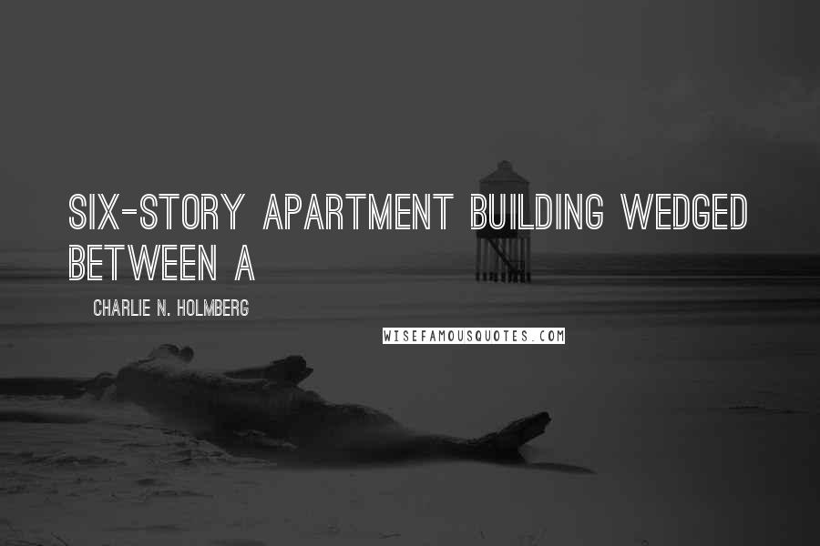 Charlie N. Holmberg quotes: six-story apartment building wedged between a