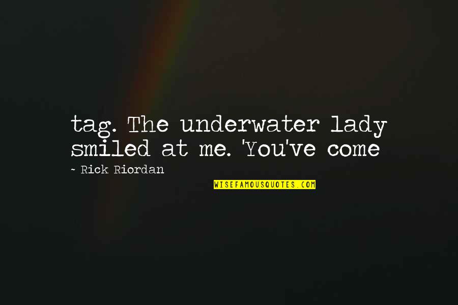 Chartering Quotes By Rick Riordan: tag. The underwater lady smiled at me. 'You've