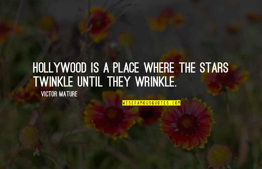 Chary Quotes By Victor Mature: Hollywood is a place where the stars twinkle
