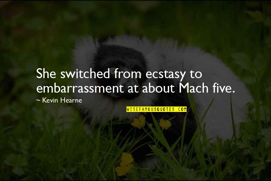 Cheesiness Synonym Quotes By Kevin Hearne: She switched from ecstasy to embarrassment at about