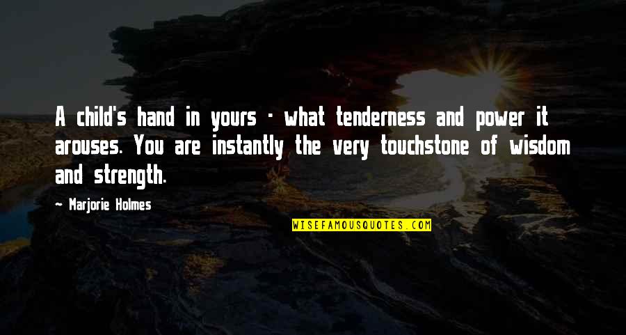 Child Strength Quotes By Marjorie Holmes: A child's hand in yours - what tenderness
