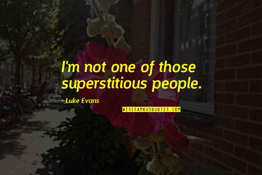 Choicest Blessings Quotes By Luke Evans: I'm not one of those superstitious people.