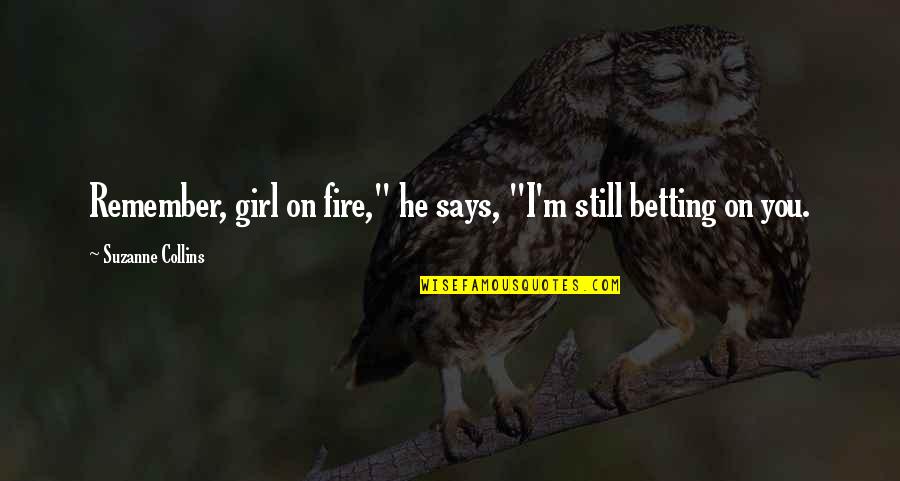 Cinna's Quotes By Suzanne Collins: Remember, girl on fire," he says, "I'm still Cinna's Quotes By Suzanne Collins: Remember, girl on fire," he says, "I'm still