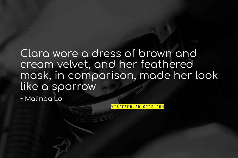 Clara's Quotes By Malinda Lo: Clara wore a dress of brown and cream