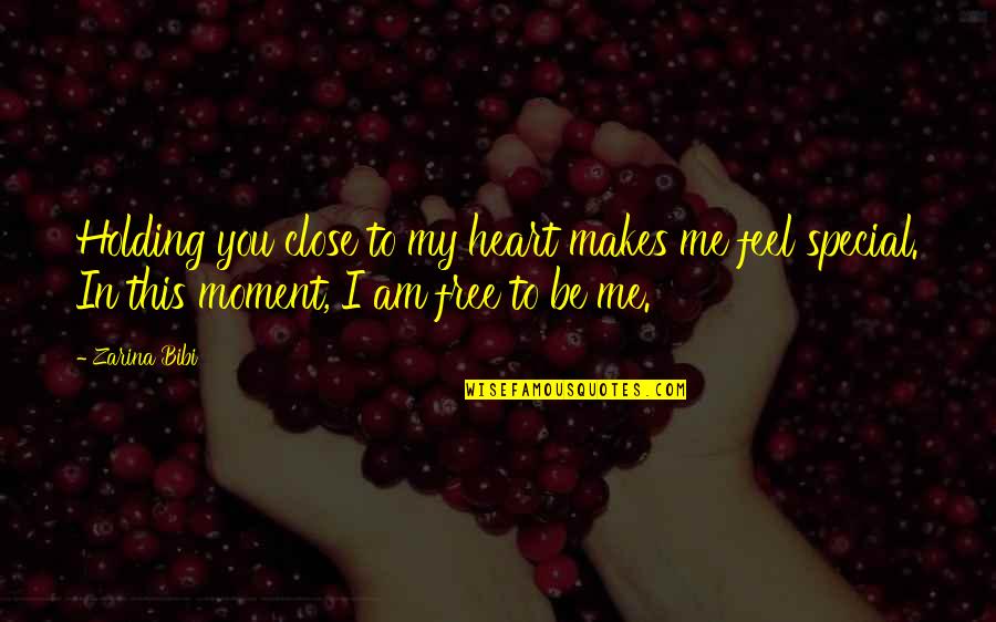 Close To Heart Quotes By Zarina Bibi: Holding you close to my heart makes me
