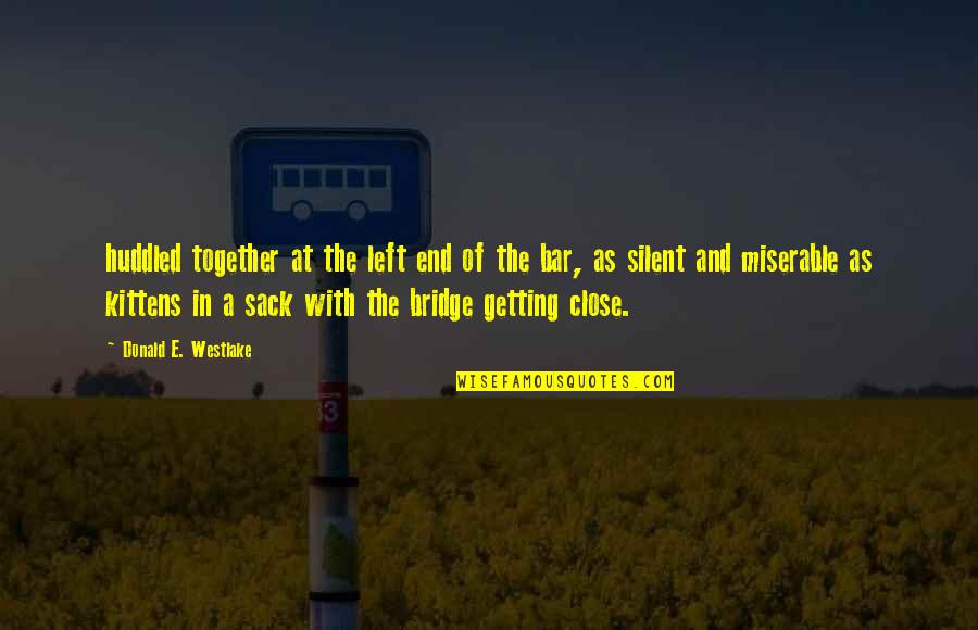 Close Together Quotes By Donald E. Westlake: huddled together at the left end of the Close Together Quotes By Donald E. Westlake: huddled together at the left end of the
