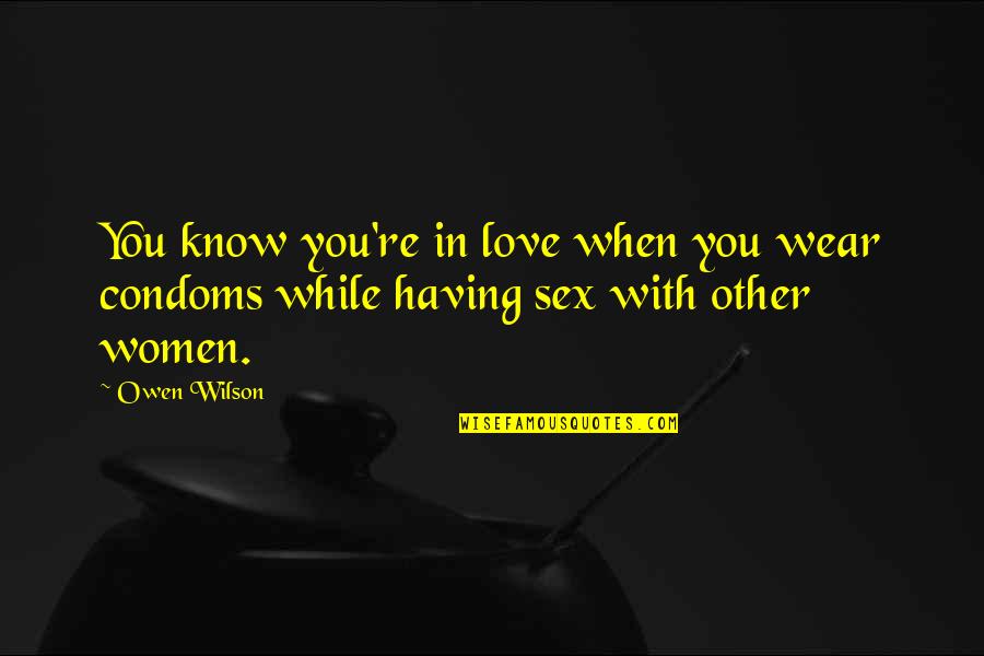 Condoms Quotes By Owen Wilson: You know you're in love when you wear