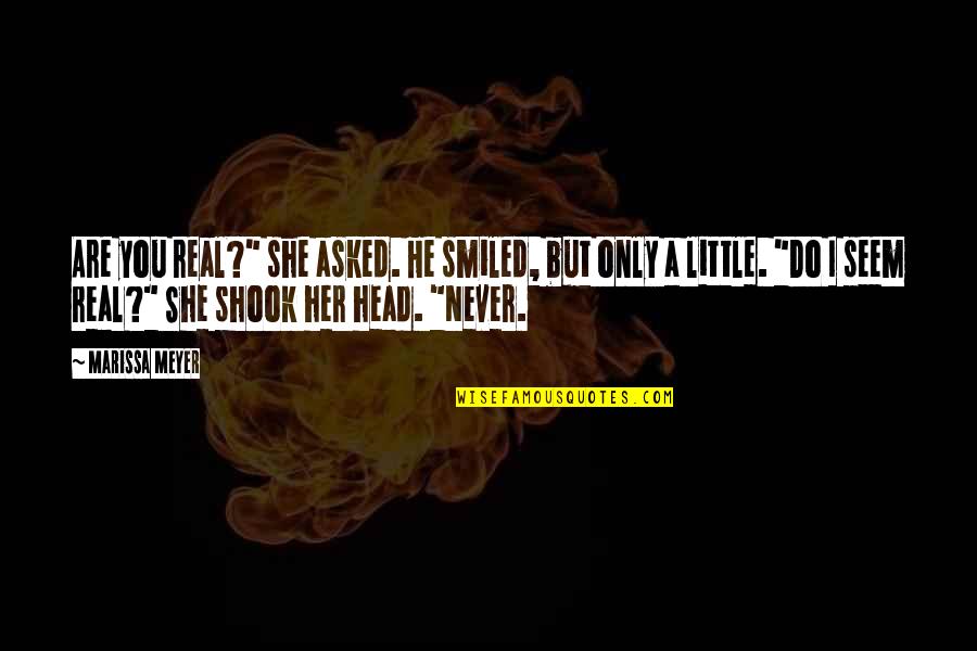 Consume Me With Your Fire Quotes By Marissa Meyer: Are you real?" she asked. He smiled, but