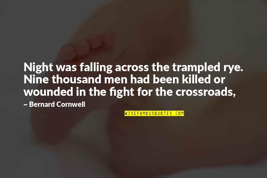 Crossroads Quotes By Bernard Cornwell: Night was falling across the trampled rye. Nine