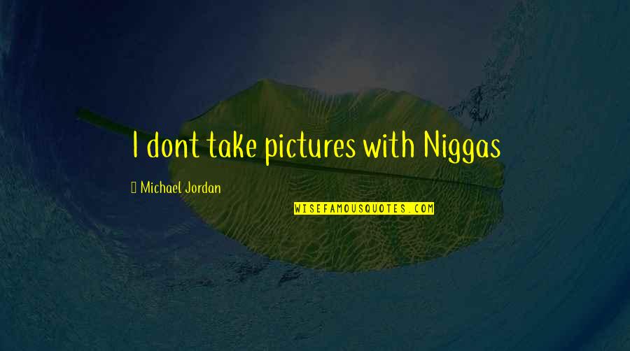 Cute Facebook Caption Quotes By Michael Jordan: I dont take pictures with Niggas