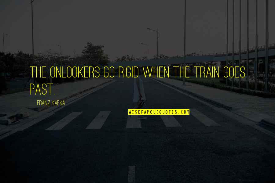 Cute Green Eyes Quotes By Franz Kafka: The onlookers go rigid when the train goes