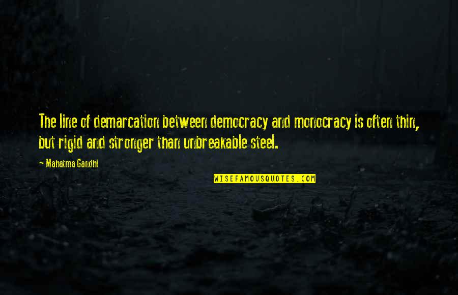 Danny Devito Penguin Quotes By Mahatma Gandhi: The line of demarcation between democracy and monocracy