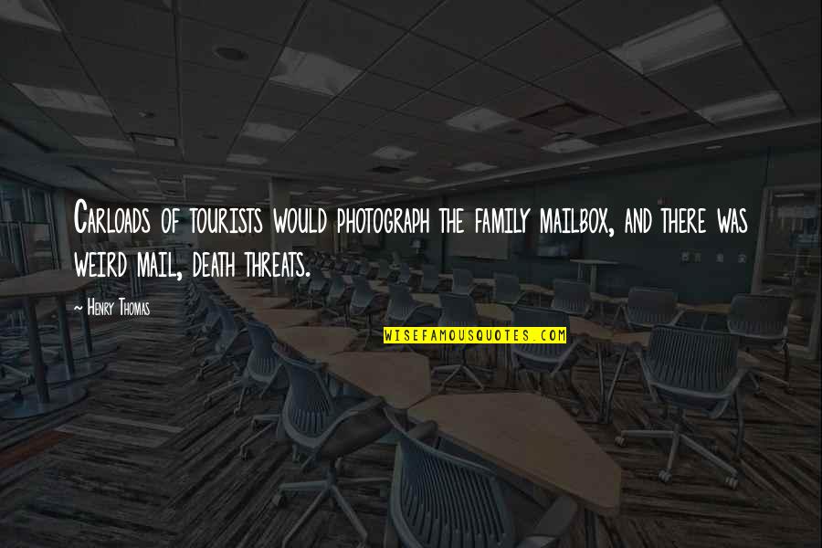 Death Of Family Quotes By Henry Thomas: Carloads of tourists would photograph the family mailbox,