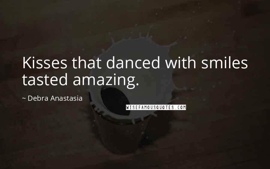 Debra Anastasia quotes: Kisses that danced with smiles tasted amazing.