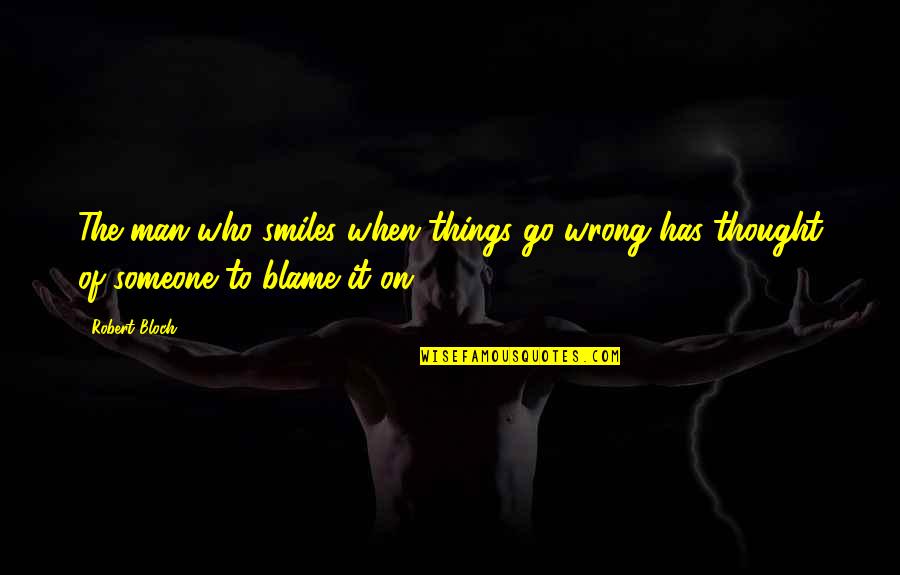 Decirselo Conjugation Quotes By Robert Bloch: The man who smiles when things go wrong